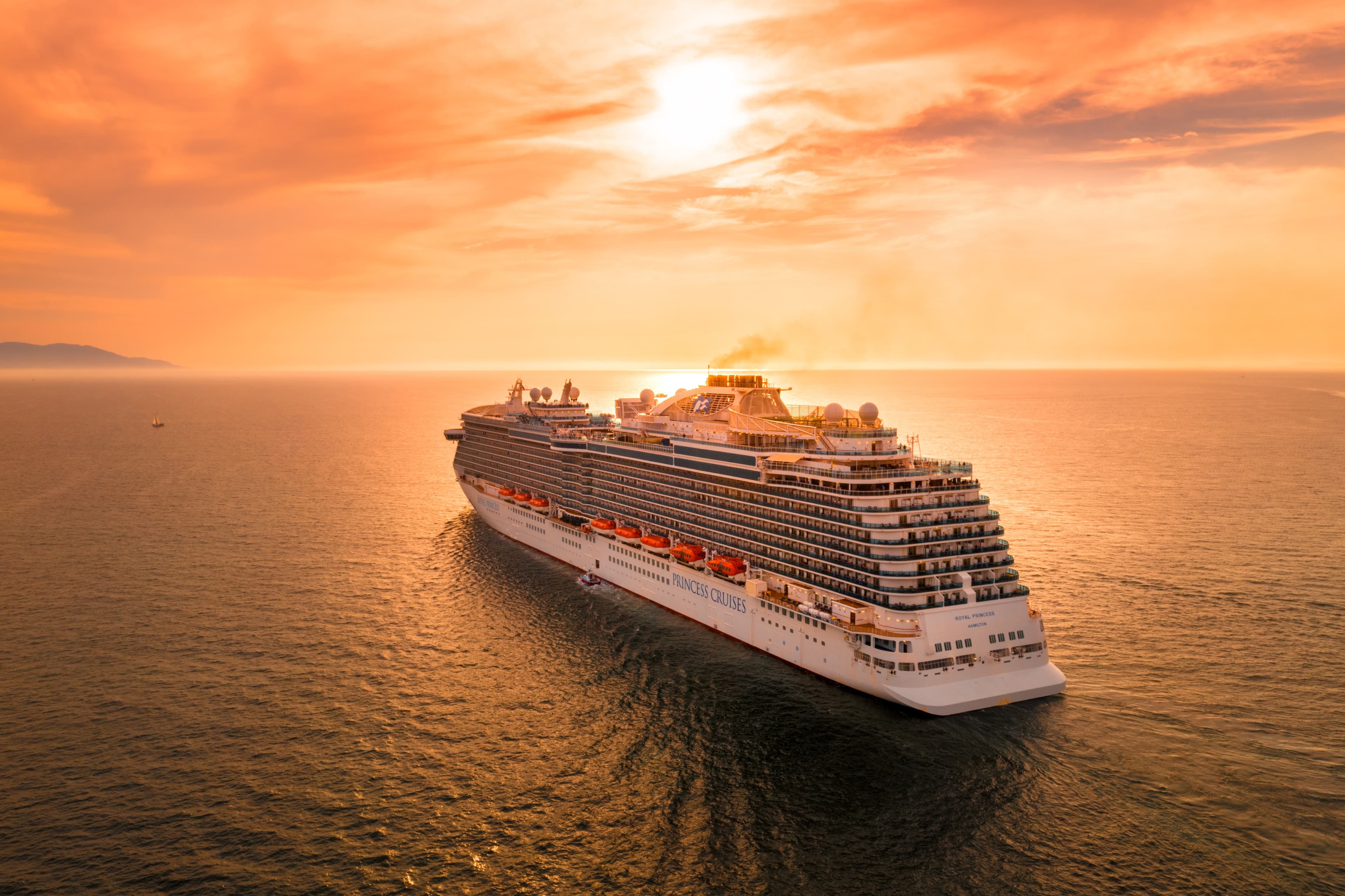 Luxury cruise ship at sunset